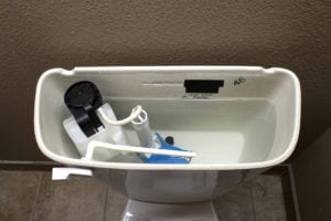 Ben Franklin Plumber working on toilet repairs in Tyler, TX 