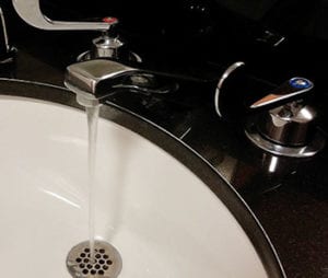 A Benjamin Franklin technician finishes a smelly drain cleaning in Tyler.