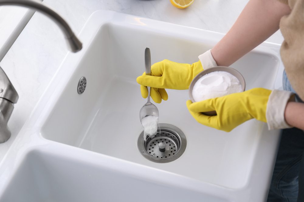 Drano Alternatives being used in a kitchen sink.