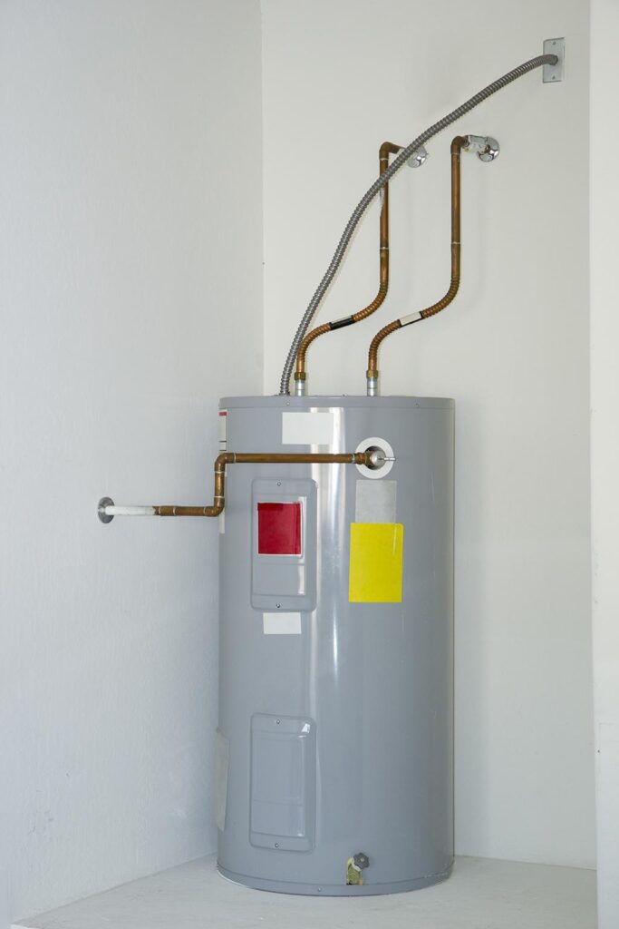 https://www.benjaminfranklinplumbingtyler.com/wp-content/uploads/2023/05/Gas-Water-Heater-vs-Electric-Water-Heater-Benjamin-Franklin-Plumbing-Tyler.jpg
