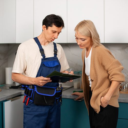 Technician performing a professional plumbing inspection using a camera system